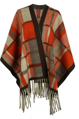 Poncho con detalle de flecos y mangas tipo capa