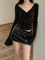 Jersey de punto de manga larga con escote en V sólido y abertura lateral tipo trompeta