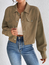 Chaqueta de manga larga con cierre a presión