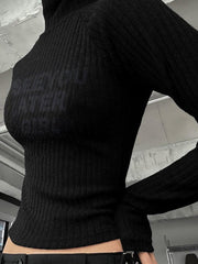 Jersey de punto ajustado de manga larga con cuello alto y canalé con estampado de letras