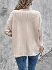Chaqueta con bolsillos, botones y hombros caídos