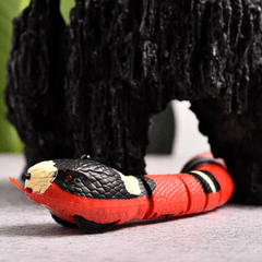 SnakeToyâ„?- Intelligent toy for cats