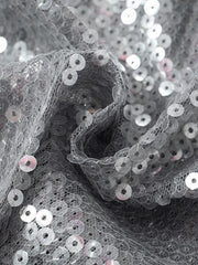 Blusa de manga larga con cuello en V y dobladillo estilo pañuelo con lentejuelas Gary