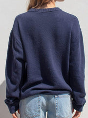 Suéter con estampado de colores en contraste