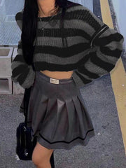 Suéter de punto a rayas con mangas extraíbles de gran tamaño