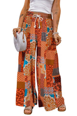 Orangefarbene Hose mit weitem Bein und Kordelzug im Boho-Patchwork-Print