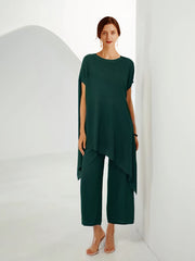 Conjunto de dos piezas de punto irregular suelto con cuello redondo en color liso