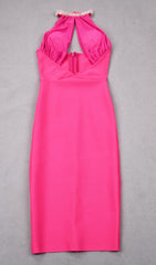 VESTIDO MIDI CON ABERTURA HALTER