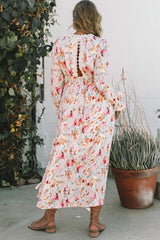 Rosa Maxikleid mit Blumenmuster und Patchwork-Ausschnitt auf der Rückseite