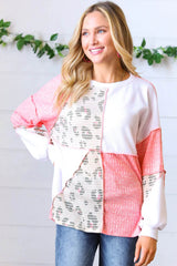 Rosa Oberteil mit Leopardenmuster und sichtbaren Nähten in zweifarbigem Blockdesign