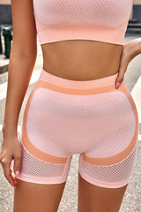 Pinkes Active Yoga-Set aus Sport-BH und Shorts