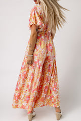 Orangefarbener Jumpsuit mit Blumenmuster, V-Ausschnitt und hoher Taille und Rüschen