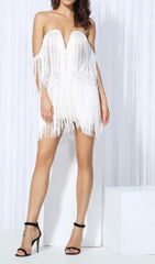 MINIKLEID MIT QUASTEN IN ROSA