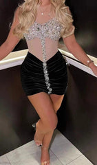 VESTIDO MIDI DE ENCAJE CON CRISTALES EN NEGRO