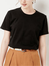 Camiseta informal de manga corta holgada con cuello redondo y color liso a la moda