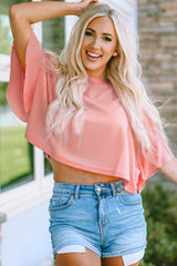 Rosa Waffelstrickbluse mit Rüschen und halblangen Ärmeln