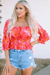 Orangefarbene Bluse mit Blumenmuster, Puffärmeln und quadratischem Ausschnitt, Schößchen