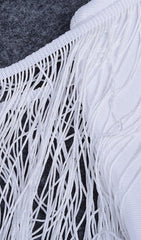 MINIKLEID MIT QUASTEN IN ROSA