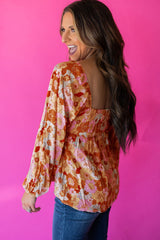 Orangefarbene Babydoll-Bluse mit Blumenmuster und quadratischem Ausschnitt und Puffärmeln