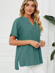 Camiseta holgada de manga corta con cuello en V liso