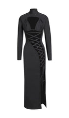 VESTIDO NEGRO CON ABERTURA IRREGULAR CON CORDONES