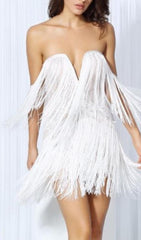 MINIKLEID MIT QUASTEN IN ROSA