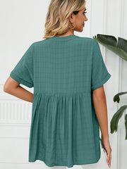 Camiseta holgada de manga corta con cuello en V liso