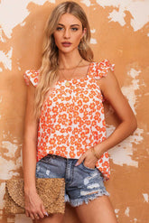 Orangefarbenes Tanktop mit Blumenmuster und Rüschen und eckigem Ausschnitt