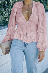 Rosa florales, strukturiertes Oberteil mit Puffärmeln, gesmokten Taillenbund und Schößchen