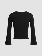 Oberteil mit Knopfleiste und ausgestellten Ärmeln