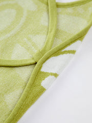 Langes Strickkleid mit Schmetterlingsmuster und offenem Rücken