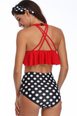 Schwarz-weiß gepunkteter Badeanzug mit Rüschen