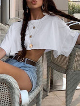 Camiseta holgada informal de cuello redondo y color liso a la moda