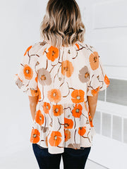 Bluse mit Volantärmeln, Bindekragen und Schößchenmuster