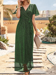 Maxikleid mit Pailletten, Überkreuz-Ausschnitt, Bindegürtel und Schlitz