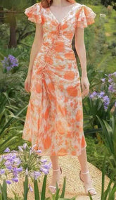 VESTIDO LARGO DE VOILE CON MANGAS CON VOLANTES EN ROSA