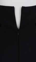 VESTIDO MINI CON BOTONES ESCULTURALES EN NEGRO