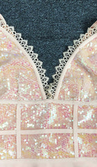 VESTIDO MIDI IRREGULAR CON LENTEJUELAS EN ROSA