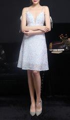 VESTIDO MIDI CON LENTEJUELAS Y ESCOTE PROFUNDO