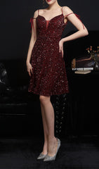 VESTIDO MIDI CON LENTEJUELAS Y ESCOTE PROFUNDO