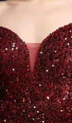 VESTIDO MIDI CON LENTEJUELAS Y ESCOTE PROFUNDO