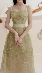 VESTIDO MIDI DE MALLA CON TIRANTES ESPAGUETI