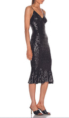 Schwarzes Kleid mit Strumpfhalterstern und Diamanten