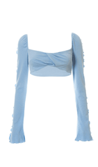 Tube-Top und langärmlige Weste.