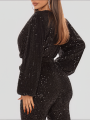 Jumpsuit mit tiefem V-Ausschnitt, Pailletten und langen Ärmeln und weitem Bein