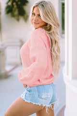 Rosafarbener, langärmliger Zopfmusterpullover mit V-Ausschnitt