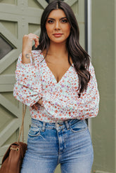 Bodysuit mit tiefem V-Ausschnitt und Blumenmuster