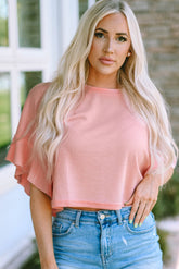 Rosa Waffelstrickbluse mit Rüschen und halblangen Ärmeln