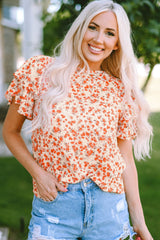 Blusa con mangas abullonadas y estampado floral naranja
