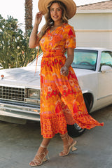 Vestido largo bohemio floral naranja con cintura fruncida y abertura